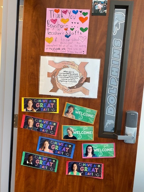 Some staff pictures on Ms. Baker's door- we miss you!